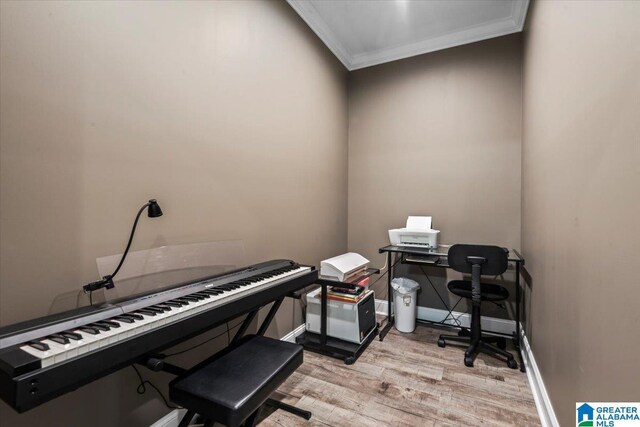 1520 Day Gap Rd, Cullman, AL 35057 - home office with crown molding, baseboards, and light wood-style flooring