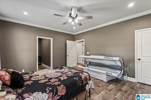 1520 Day Gap Rd, Cullman, AL 35057 - bedroom featuring crown molding, recessed lighting, a ceiling fan, and wood finished floors