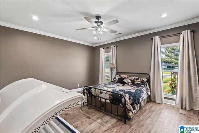 1520 Day Gap Rd, Cullman, AL 35057 - bedroom with visible vents, recessed lighting, wood finished floors, and multiple windows