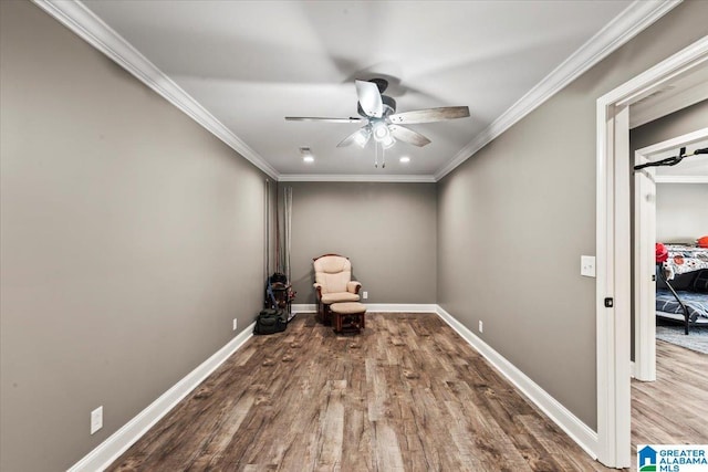 1520 Day Gap Rd, Cullman, AL 35057 - unfurnished room featuring crown molding, a ceiling fan, baseboards, and wood finished floors