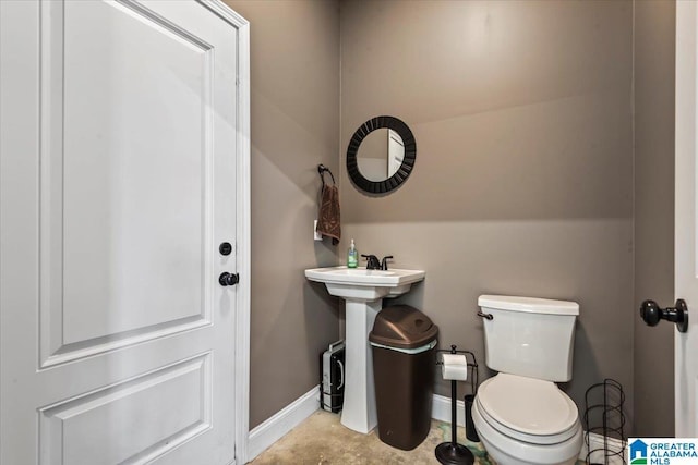 1520 Day Gap Rd, Cullman, AL 35057 - bathroom featuring baseboards and toilet