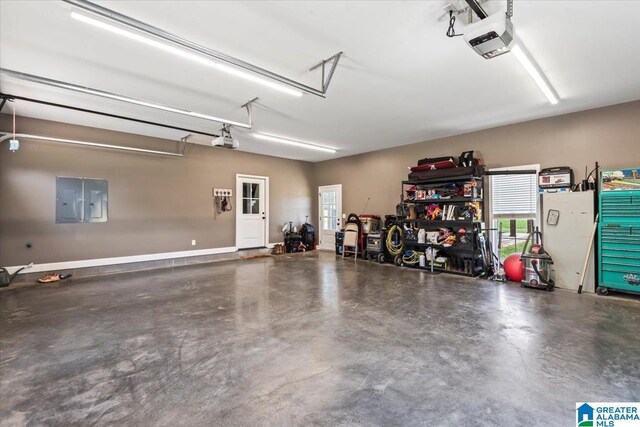 1520 Day Gap Rd, Cullman, AL 35057 - garage featuring a garage door opener and electric panel