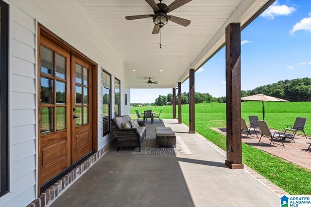 1520 Day Gap Rd, Cullman, AL 35057 - view of patio / terrace featuring ceiling fan and french doors