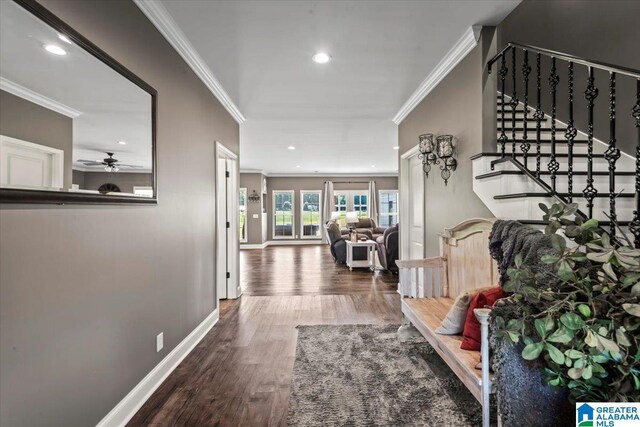 1520 Day Gap Rd, Cullman, AL 35057 - corridor featuring crown molding, stairway, recessed lighting, and wood finished floors