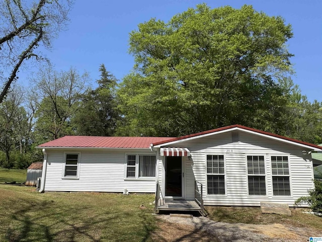 2928 University Way, Centreville, AL 35042 - single story home with metal roof and a front lawn