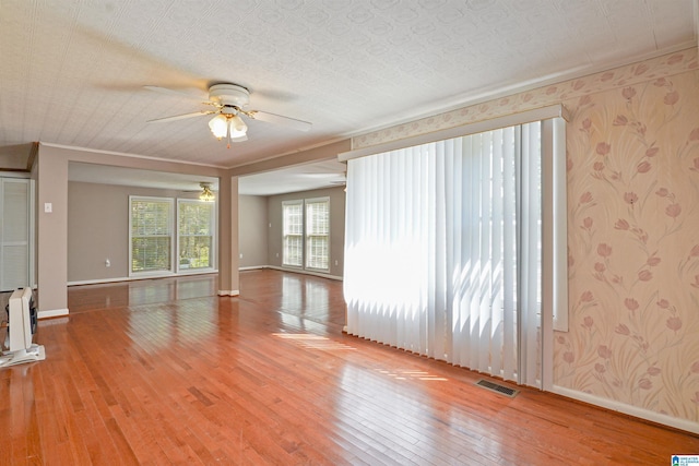2928 University Way, Centreville, AL 35042 - unfurnished room with ceiling fan, visible vents, baseboards, and hardwood / wood-style flooring
