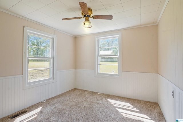 2928 University Way, Centreville, AL 35042 - carpeted empty room with a wainscoted wall, visible vents, and a wealth of natural light