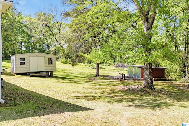 2928 University Way, Centreville, AL 35042 - view of yard featuring an outdoor structure and a shed