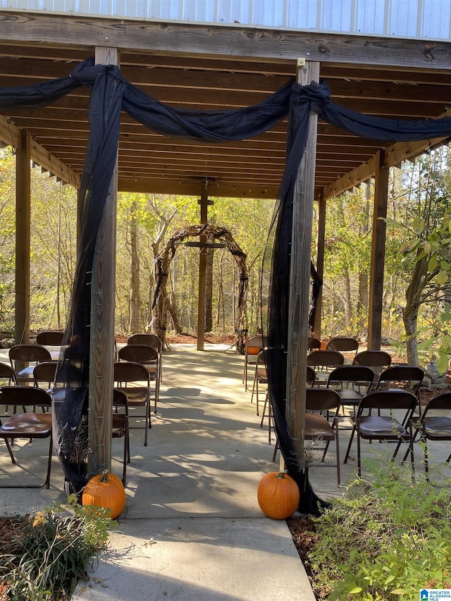 surrounding community with a patio area