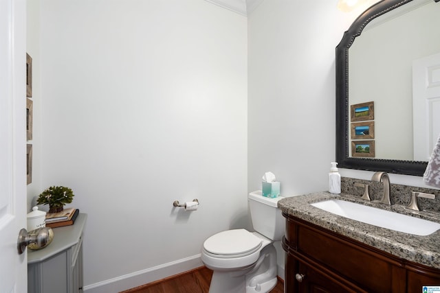1012 Oak Tree Rd, Hoover, AL 35244 - bathroom with vanity, baseboards, wood finished floors, and toilet