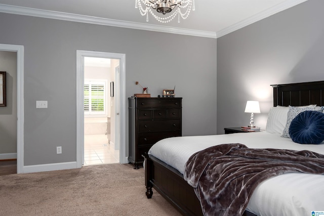 1012 Oak Tree Rd, Hoover, AL 35244 - bedroom with crown molding, a notable chandelier, light carpet, ensuite bath, and baseboards