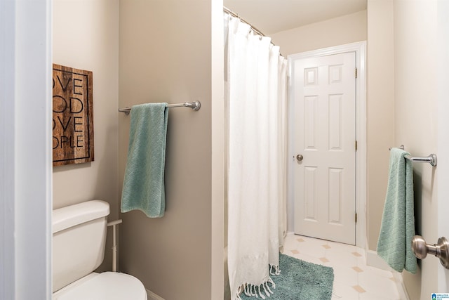 1012 Oak Tree Rd, Hoover, AL 35244 - full bathroom featuring tile patterned floors, toilet, and curtained shower