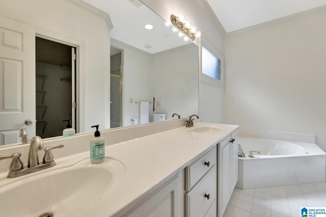bathroom with double vanity, a sink, a garden tub, and a stall shower