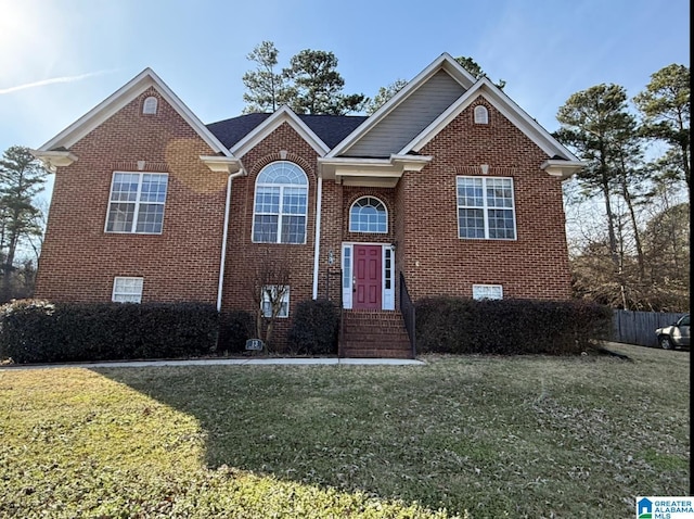 13 Autumn Trce, Odenville, AL 35120 - raised ranch featuring brick siding, fence, and a front lawn