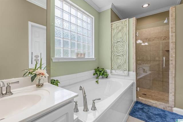 bathroom with vanity, recessed lighting, a shower stall, ornamental molding, and a garden tub
