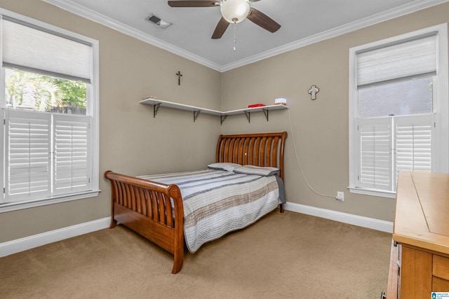 bedroom featuring visible vents, ornamental molding, baseboards, and light colored carpet