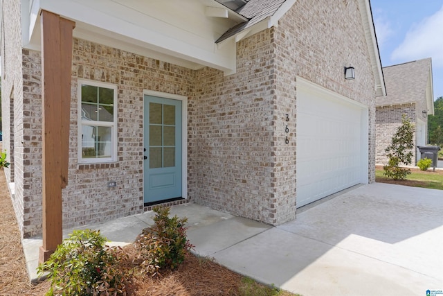 377 Shiloh Creek Dr, Calera, AL 35040 - entrance to property with driveway, brick siding, and an attached garage