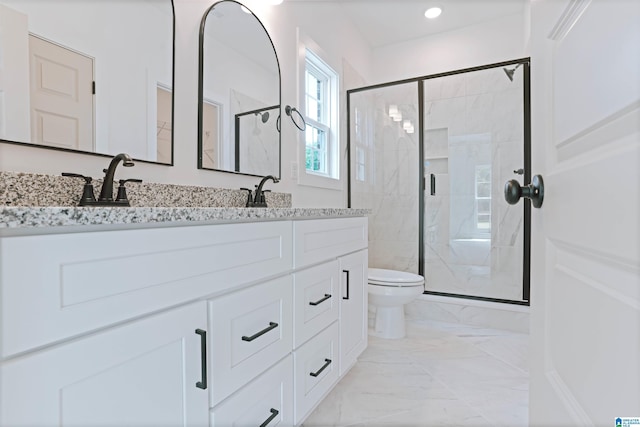 377 Shiloh Creek Dr, Calera, AL 35040 - full bath featuring a marble finish shower, marble finish floors, double vanity, toilet, and recessed lighting