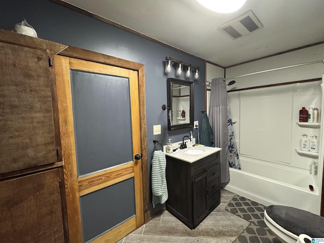 full bathroom with visible vents, shower / bath combination with curtain, and vanity