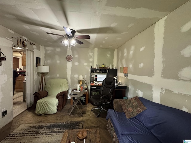 living area with ceiling fan