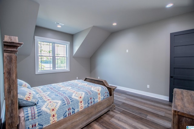 bedroom featuring recessed lighting, baseboards, visible vents, and wood finished floors