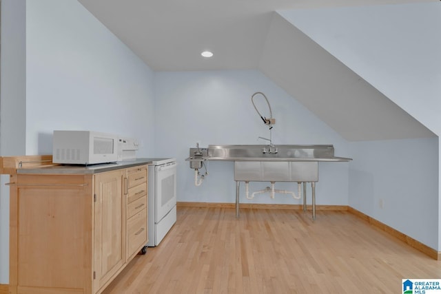 washroom with recessed lighting, baseboards, and light wood-style flooring