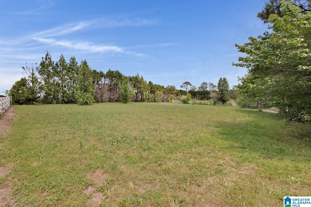 view of yard with fence