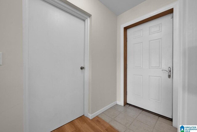 interior space featuring baseboards