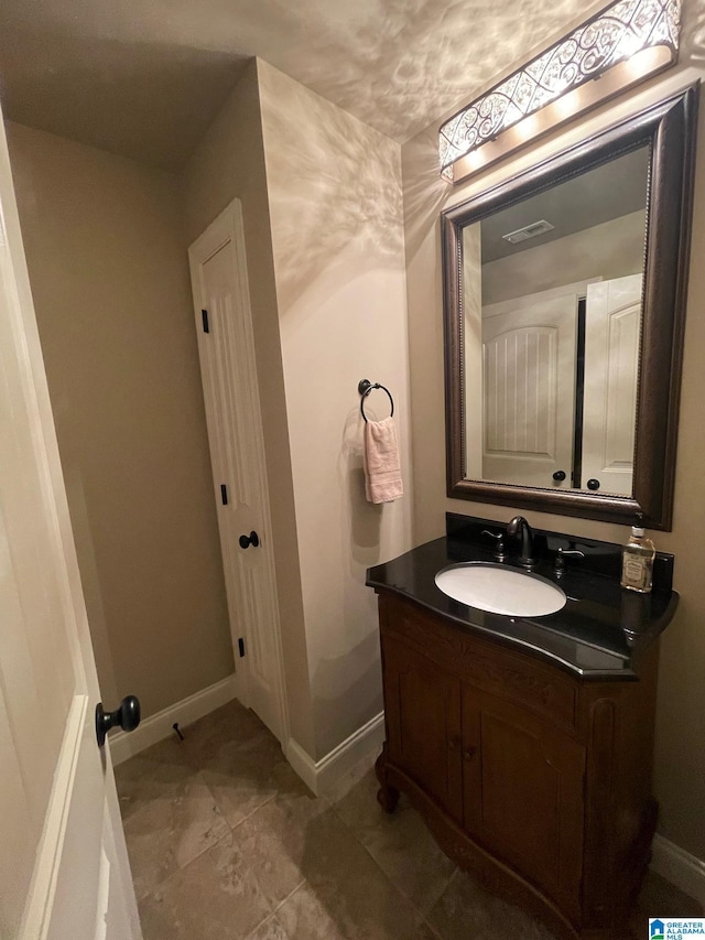 184 Grey Oaks Ct, Pelham, AL 35124 - bathroom with vanity, baseboards, and tile patterned floors