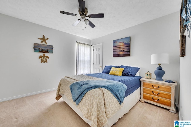 1522 Bower Dr SE, Cullman, AL 35055 - bedroom featuring baseboards, light carpet, a ceiling fan, and a textured ceiling