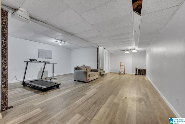 1522 Bower Dr SE, Cullman, AL 35055 - exercise area with track lighting, baseboards, a drop ceiling, and wood finished floors