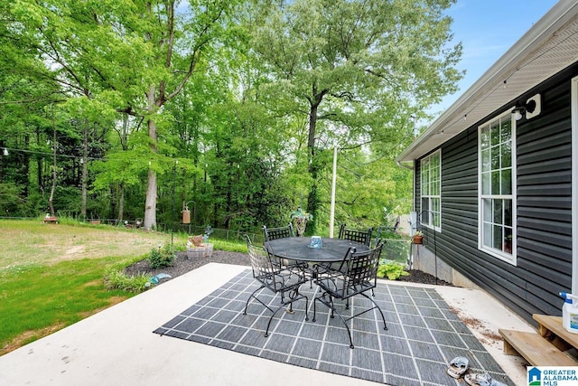 1522 Bower Dr SE, Cullman, AL 35055 - view of patio featuring fence and outdoor dining space