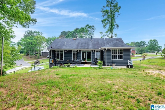 1522 Bower Dr SE, Cullman, AL 35055 - view of front of house featuring a patio area and a front lawn
