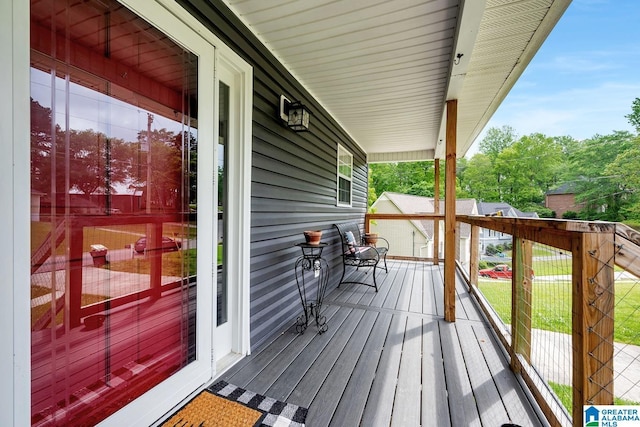 1522 Bower Dr SE, Cullman, AL 35055 - wooden deck featuring covered porch