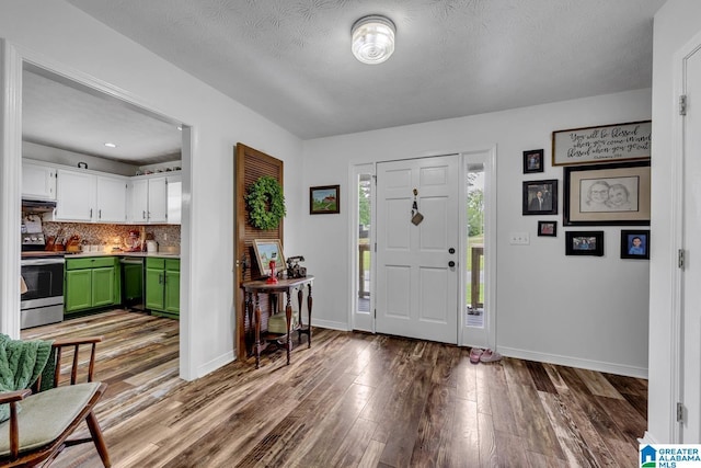 1522 Bower Dr SE, Cullman, AL 35055 - entrance foyer with baseboards and wood finished floors