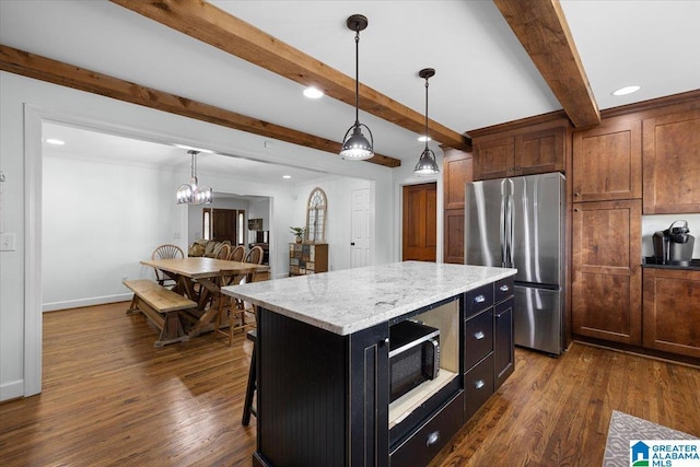 kitchen featuring recessed lighting, freestanding refrigerator, dark wood-type flooring, and beam ceiling