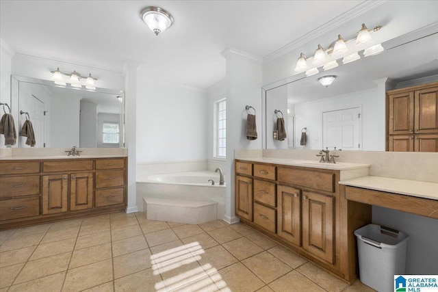 bathroom featuring a sink, crown molding, a bath, and two vanities