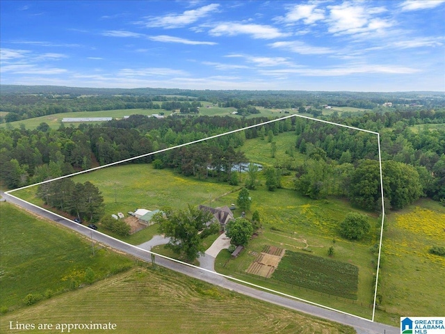 aerial view featuring a view of trees