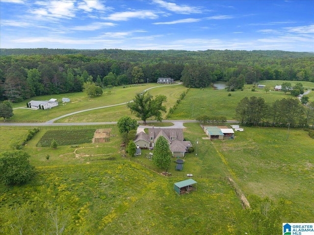 aerial view with a forest view and a rural view