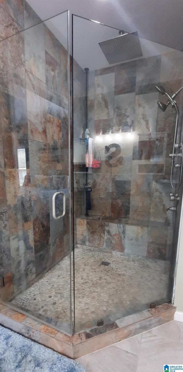 bathroom with a stall shower
