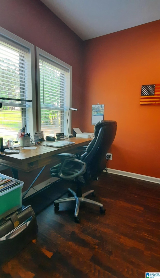 office area with baseboards and wood finished floors