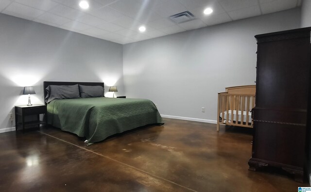 bedroom featuring recessed lighting, baseboards, visible vents, and finished concrete flooring