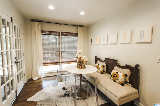 sitting room featuring french doors, recessed lighting, baseboards, and wood finished floors