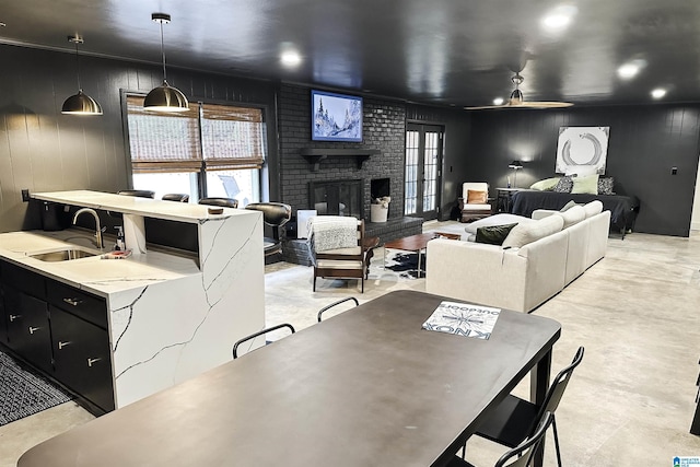 interior space with concrete floors and a fireplace