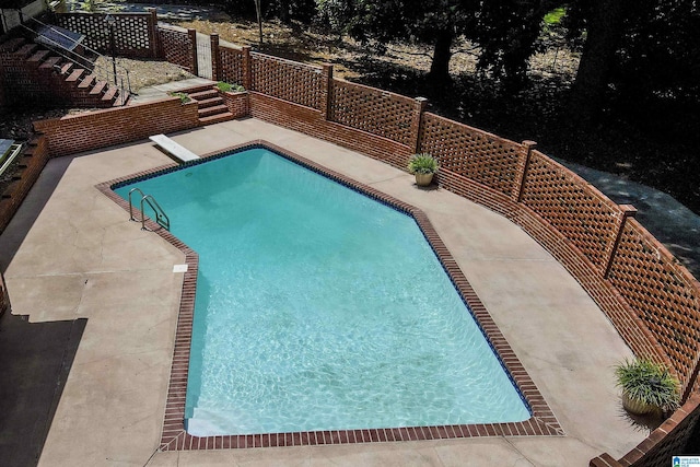 5 Christopher Way, Anniston, AL 36207 - swimming pool featuring a diving board, stairway, and a patio