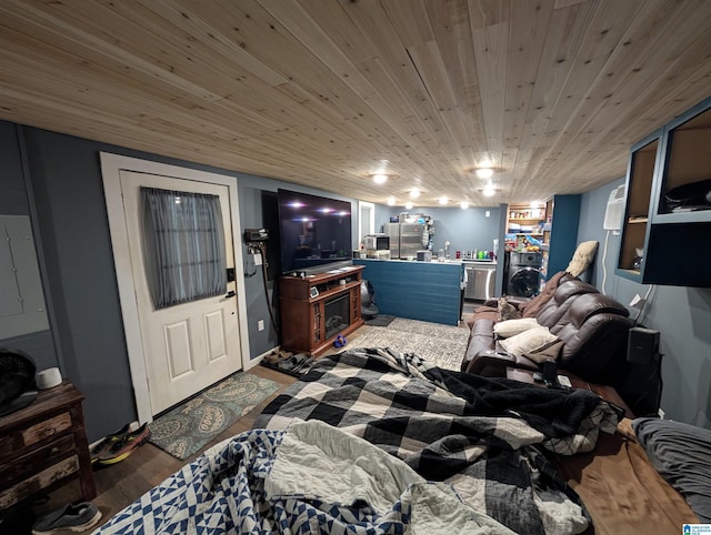 living area featuring wood finished floors and wooden ceiling
