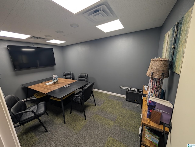 home office featuring carpet floors, baseboards, and visible vents