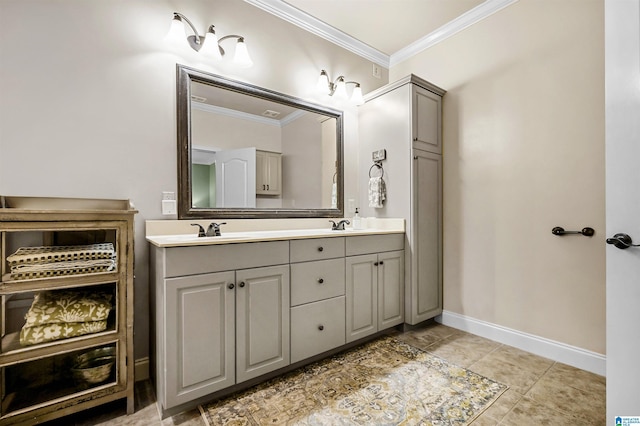 full bathroom with crown molding, baseboards, double vanity, and a sink