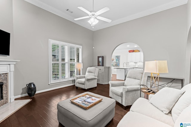 3057 Valley Ridge Rd, Hoover, AL 35242 - living area featuring crown molding, a high end fireplace, wood finished floors, and visible vents