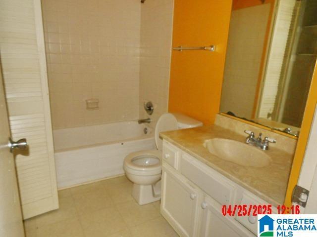 3821 Windhover Cir Unit 6, Vestavia Hills, AL 35216 - bathroom with vanity, tile patterned flooring, toilet, and tub / shower combination